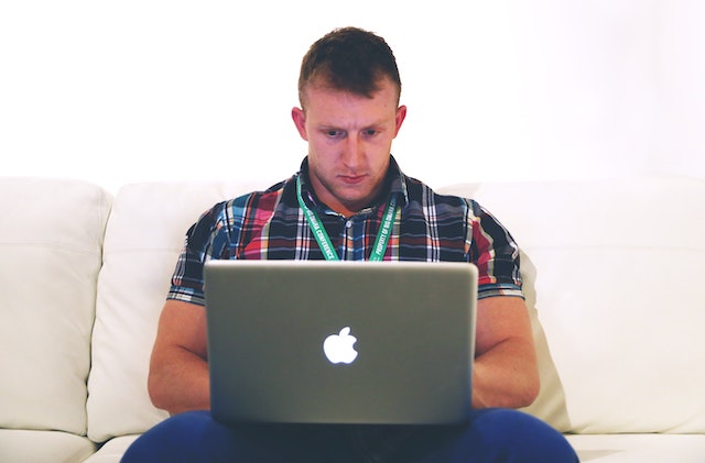 man working on computer, compose email