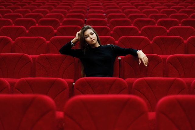 woman in theater seat