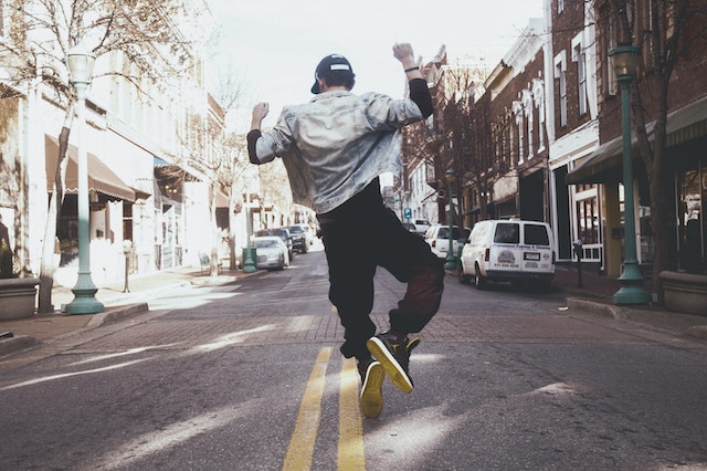 man dancing in street