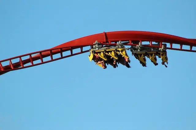 roller coaster full of people upside down