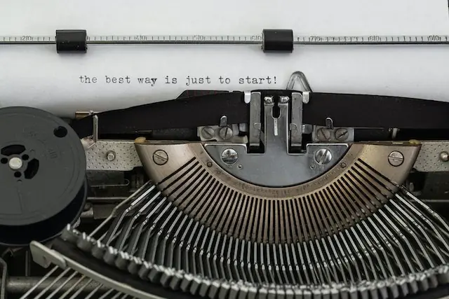 paper in typewriter says just start