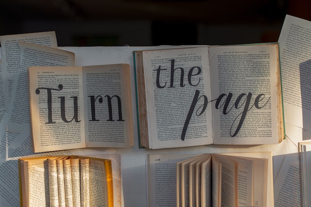books with text: turn the page