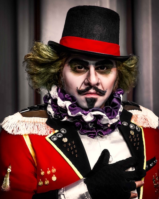 Circus ringmaster representing how a novelist needs to be in charge of the opening.