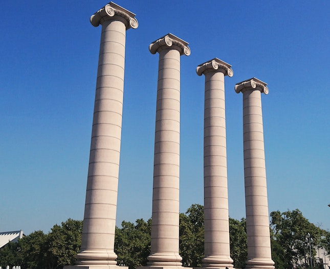 4 pillars in Barcelona illustrating the four-act structure for mystery writers