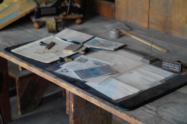 workbench covered with papers