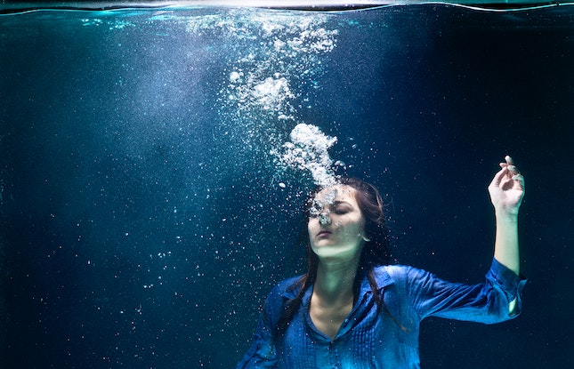woman underwater as mystery victim